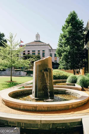 a front view of a building with street view