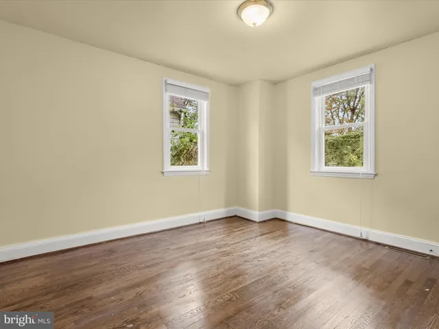 a kitchen with stainless steel appliances granite countertop a stove microwave and sink