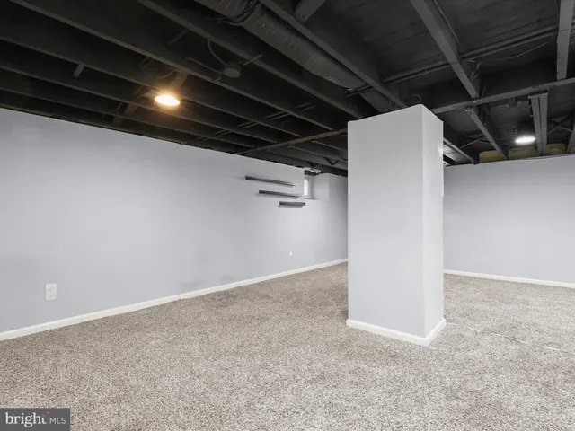 a utility room with cabinets
