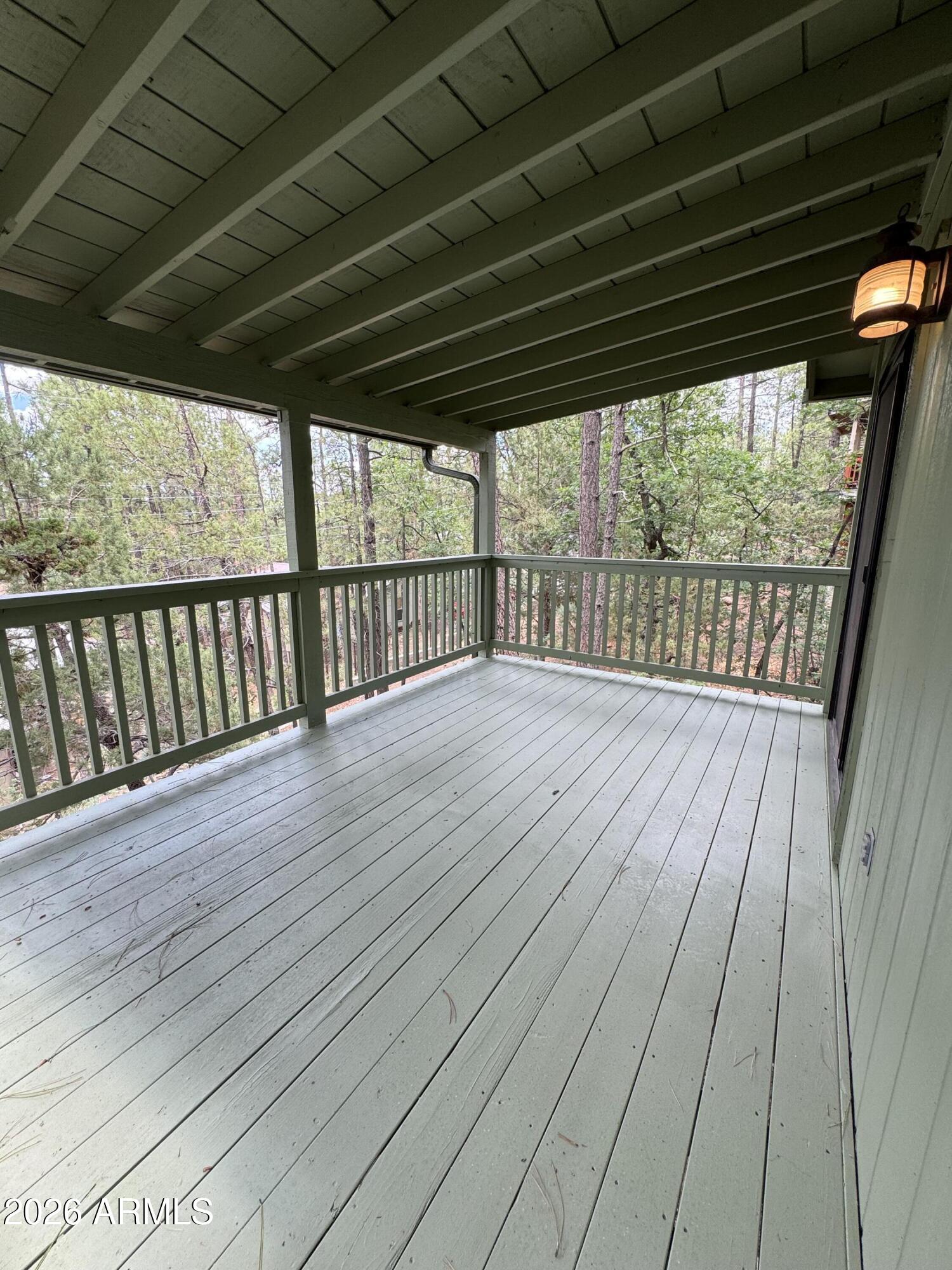 574 Walnut Creek Loop Pinetop, AZ 85935 - Photo 11 of 23 a view of deck with wooden floor