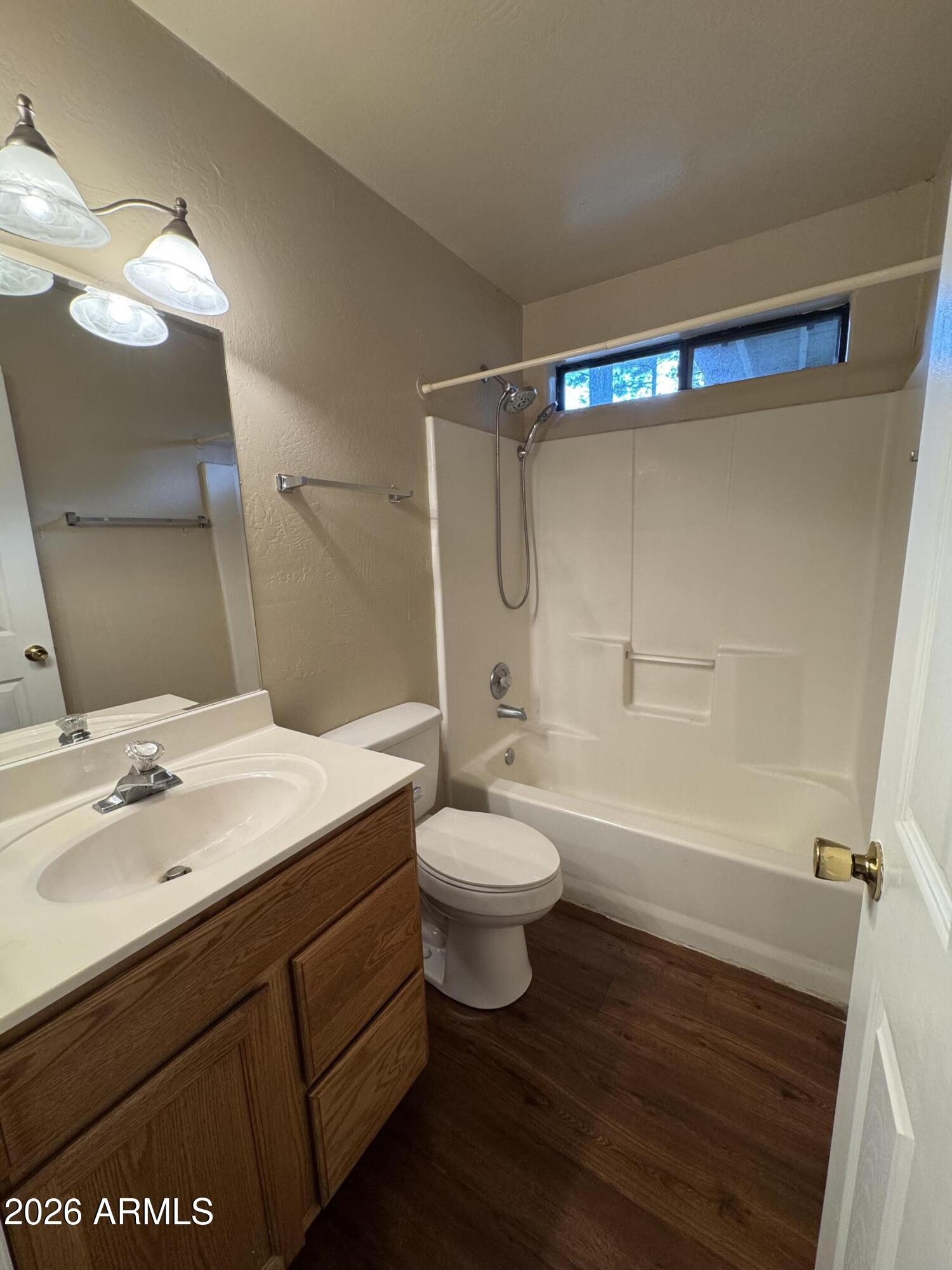 574 Walnut Creek Loop Pinetop, AZ 85935 - Photo 20 of 23 a bathroom with a sink a toilet and shower