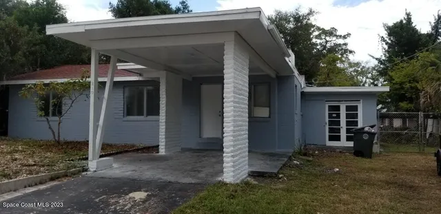 a view of house with patio