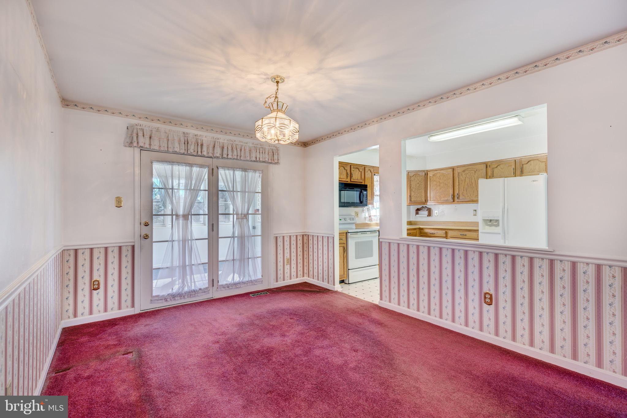 1923 Oak Lodge Road Baltimore, MD 21228 - Photo 6 of 43 Dining Room walk out to Porch