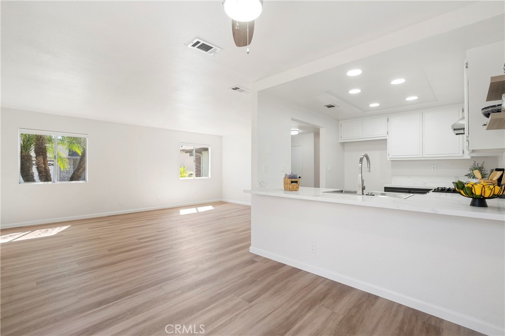 700 West 2nd Street, Unit 2 Azusa, CA 91702 - Photo 11 of 39 a view of kitchen with sink and wooden floor