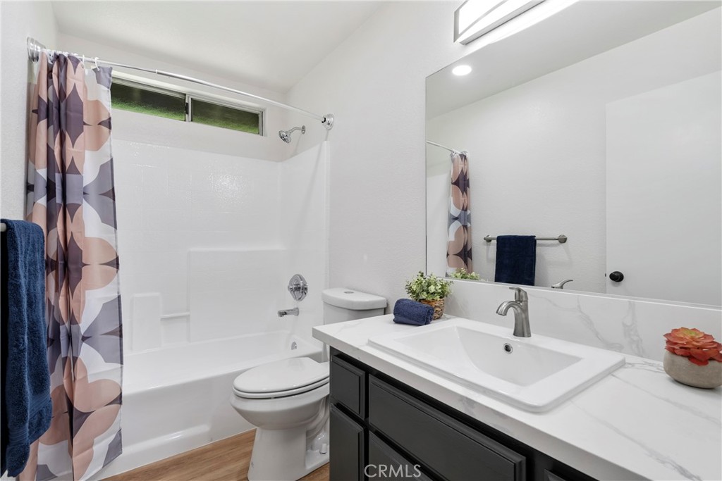 700 West 2nd Street, Unit 2 Azusa, CA 91702 - Photo 20 of 39 a bathroom with a sink a toilet and shower