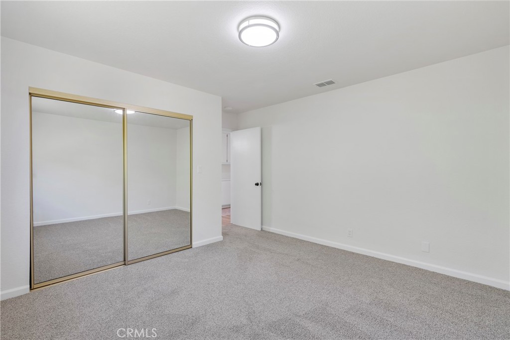 700 West 2nd Street, Unit 2 Azusa, CA 91702 - Photo 23 of 39 an empty room with glass door