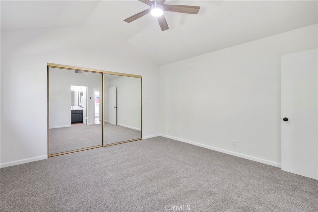 700 West 2nd Street, Unit 2 Azusa, CA 91702 - Photo 24 of 39 a view of an empty room with a ceiling fan