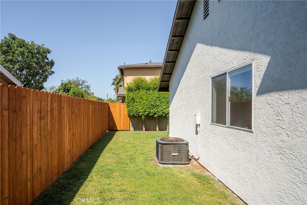 700 West 2nd Street, Unit 2 Azusa, CA 91702 - Photo 30 of 39 a view of a yard with wooden fence