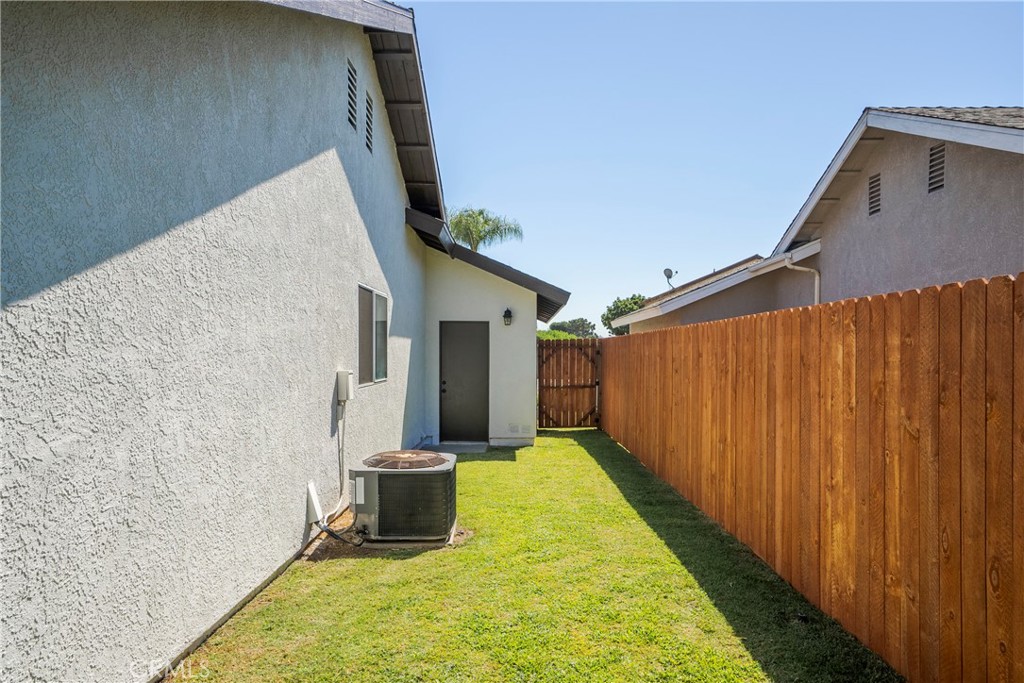 700 West 2nd Street, Unit 2 Azusa, CA 91702 - Photo 35 of 39 a view of a backyard with wooden fence