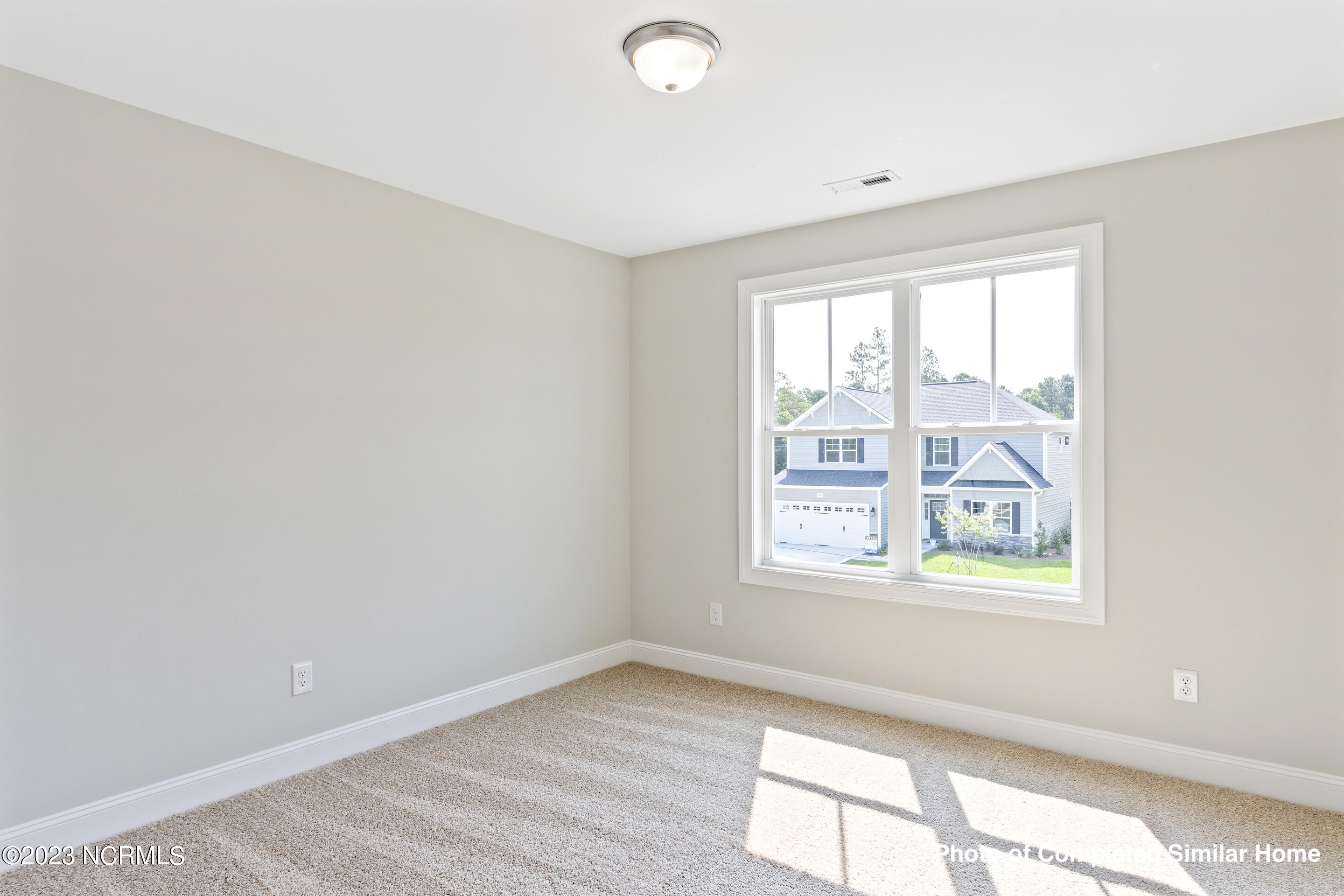 2746 Longleaf Pine Circle Leland, NC 28451 - Photo 27 of 50 Home is under construction. Photos is of completed similar home. Verify selections and finishes with onsite agent.