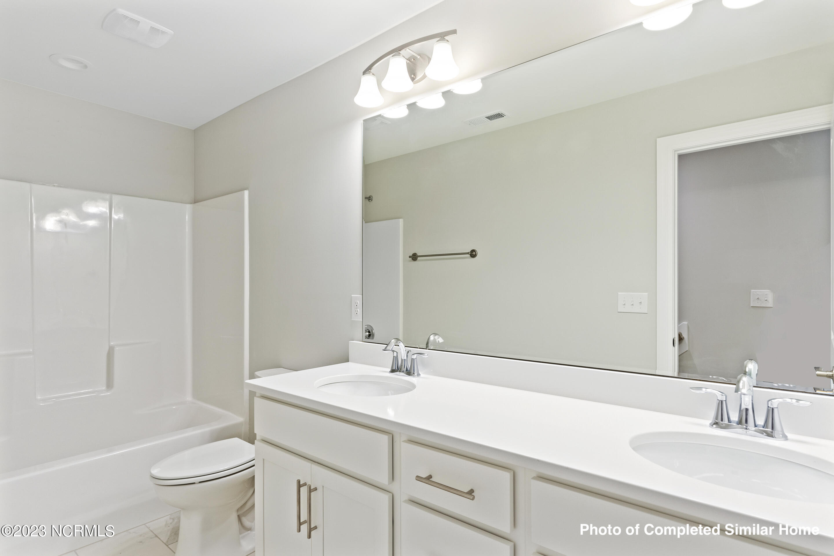 2746 Longleaf Pine Circle Leland, NC 28451 - Photo 29 of 50 Home is under construction. Photos is of completed similar home. Verify selections and finishes with onsite agent.