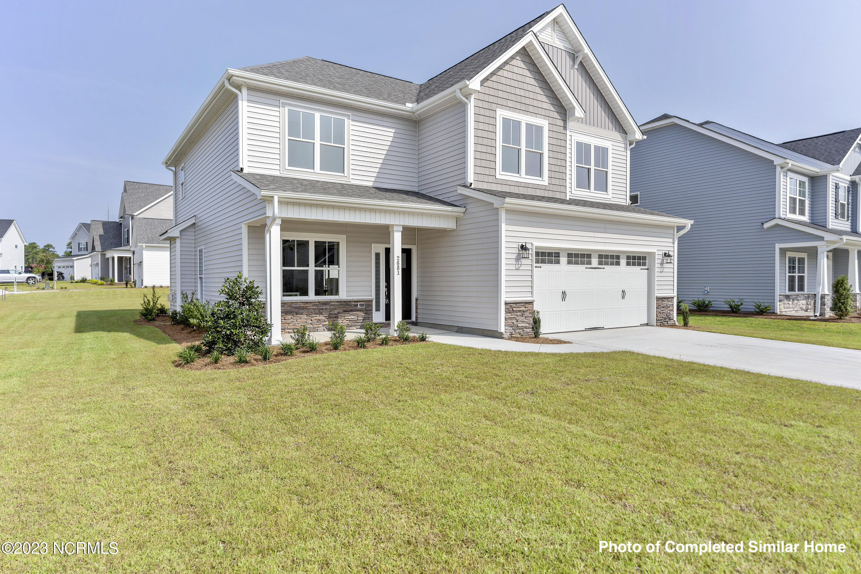 2746 Longleaf Pine Circle Leland, NC 28451 - Photo 4 of 50 Home is under construction. Photos is of completed similar home. Verify selections and finishes with onsite agent.