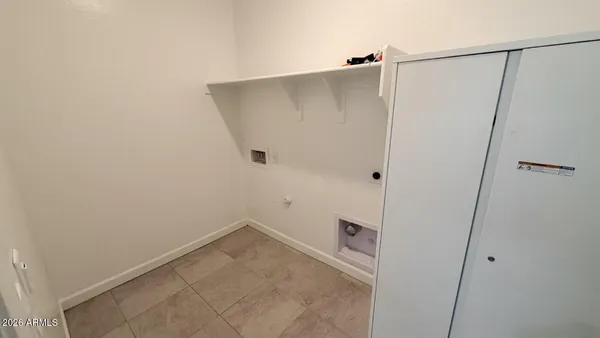 a bathroom with a shower and toilet