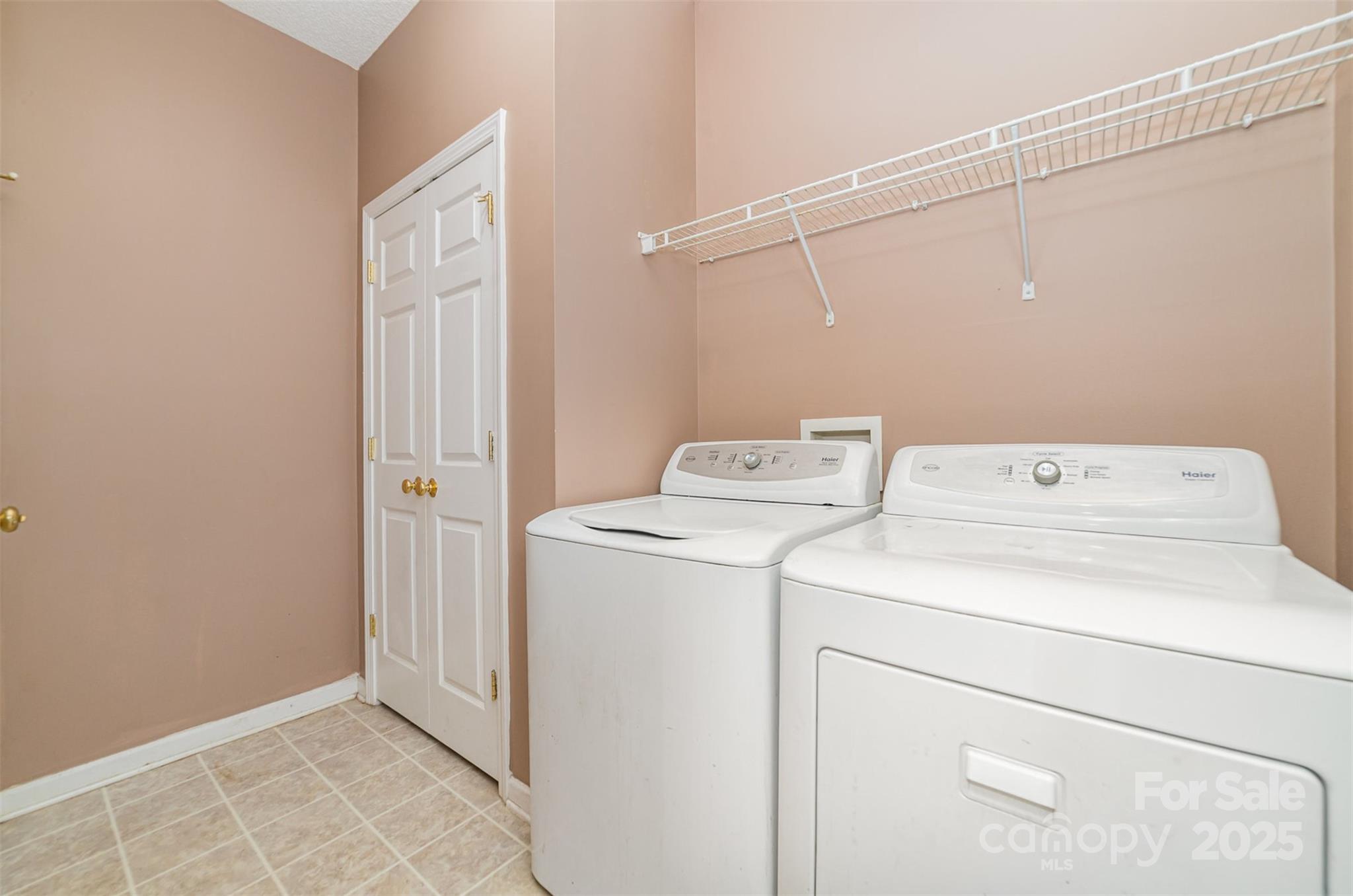168 Devon Forest Drive Mooresville, NC 28115 - Photo 18 of 21 a utility room with dryer and washer