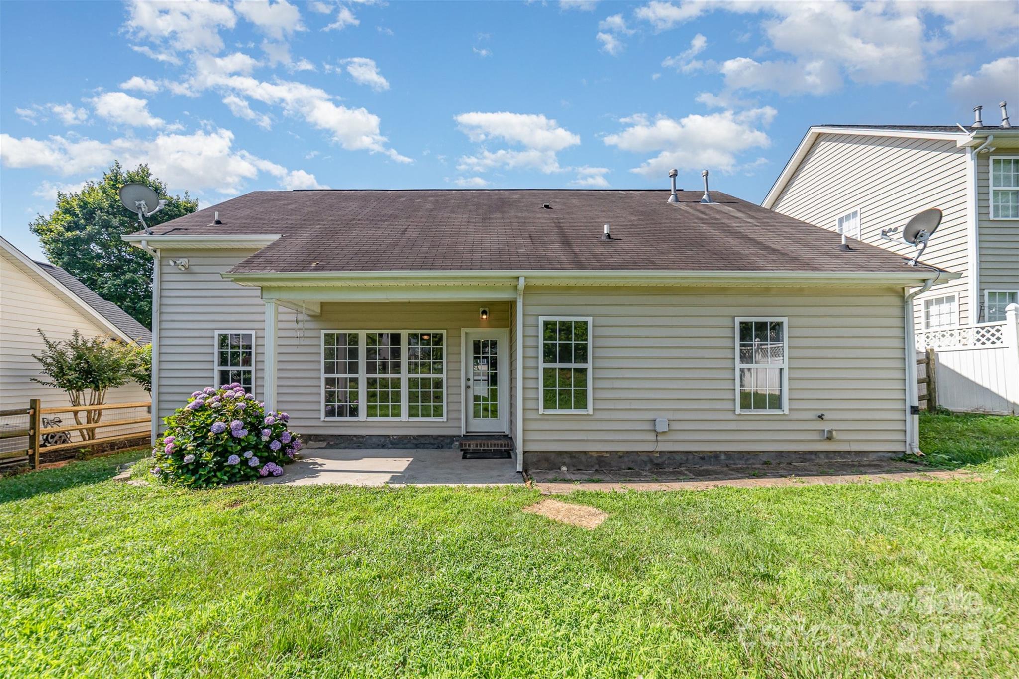 168 Devon Forest Drive Mooresville, NC 28115 - Photo 20 of 21 a front view of a house with garden