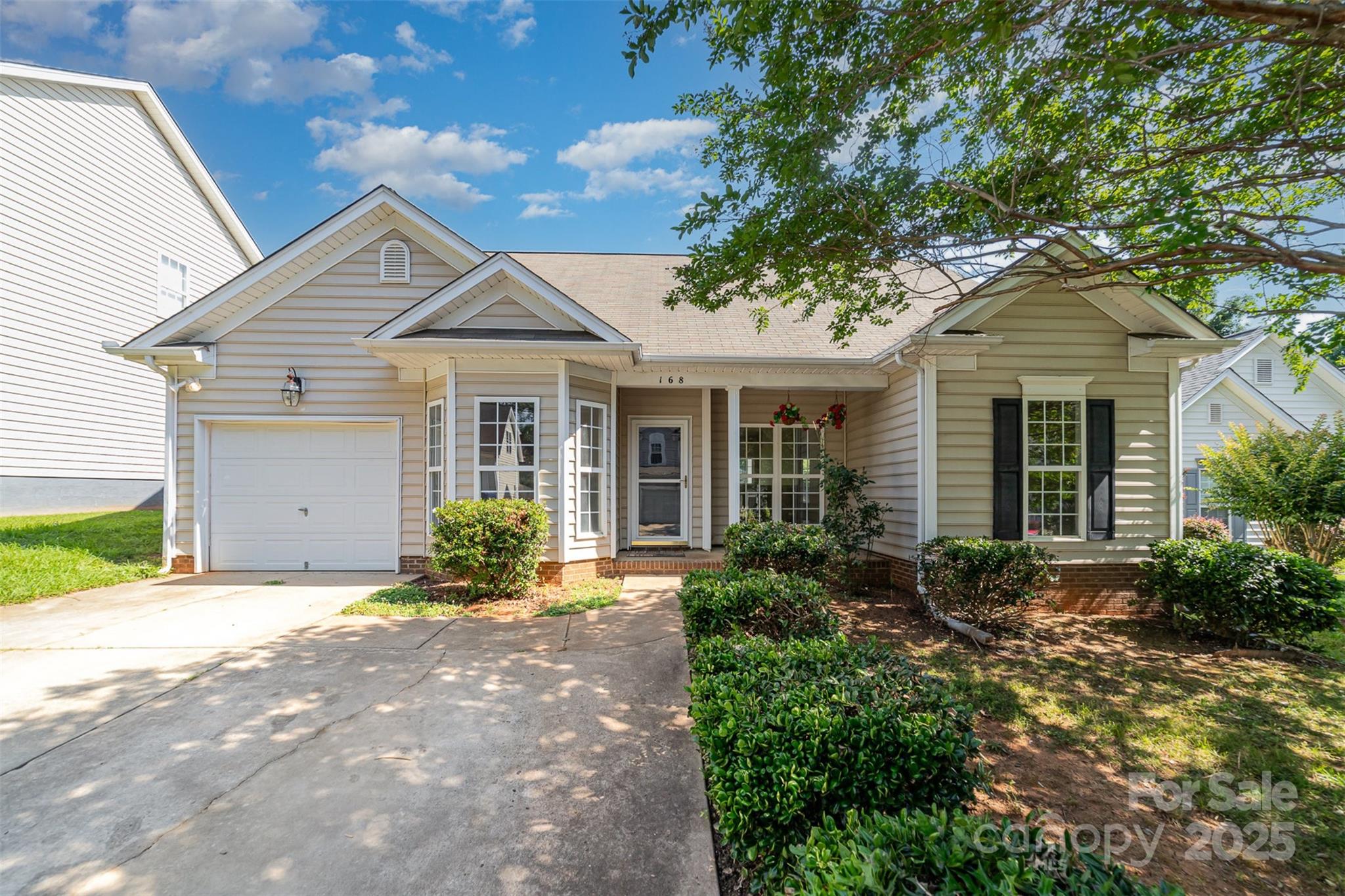 168 Devon Forest Drive Mooresville, NC 28115 - Photo 3 of 21 a front view of a house with an outdoor space