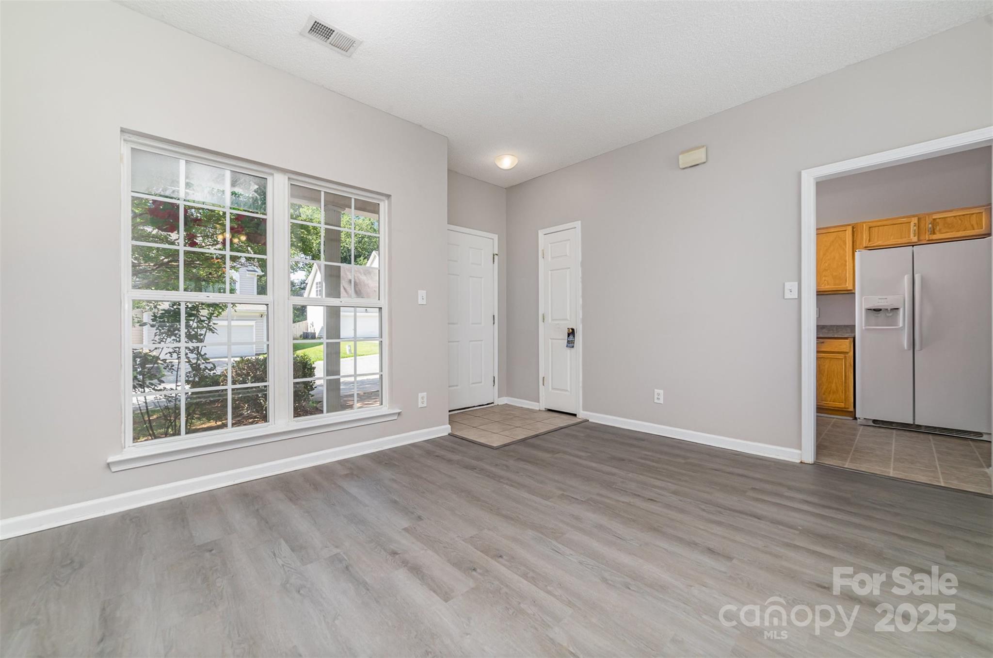 168 Devon Forest Drive Mooresville, NC 28115 - Photo 8 of 21 a view of an empty room with a window