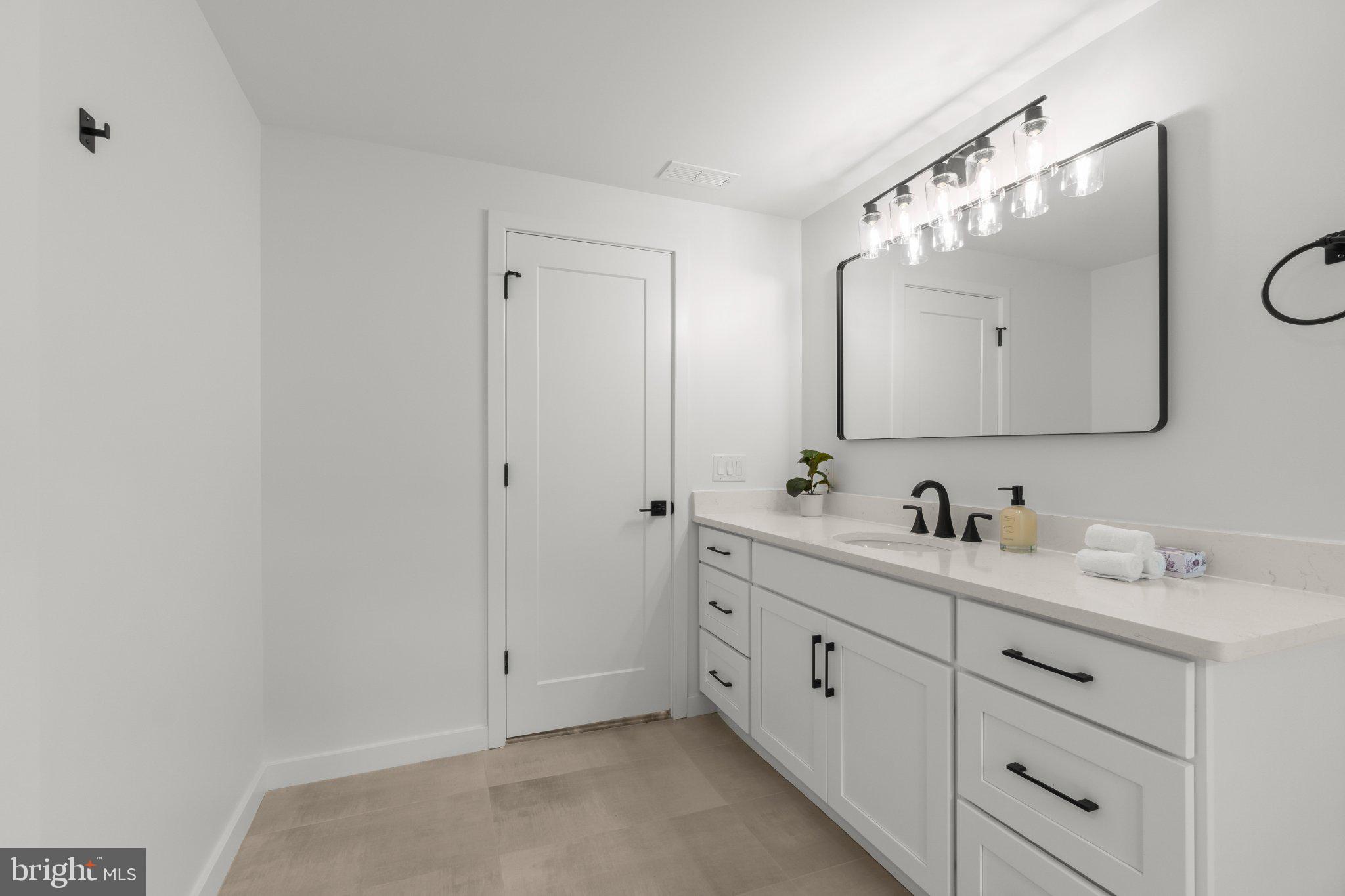 23 Nelson Ridge Road Princeton, NJ 08540 - Photo 54 of 65 Sleek modern bathroom with bright accents.