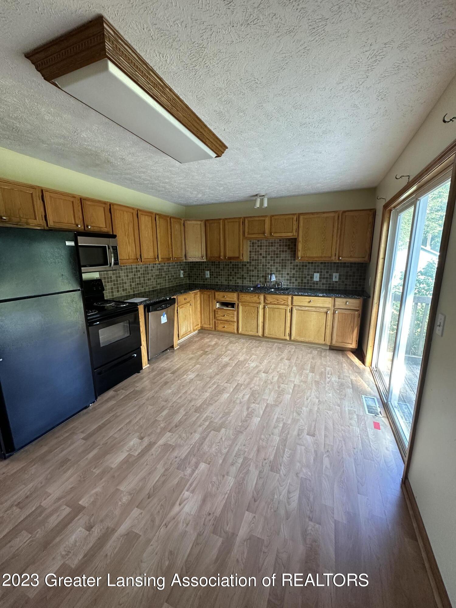 1175 West Wieland Road Lansing, MI 48906 - Photo 3 of 15 FD4B6EE4-AF14-4234-85E2-F1E20A19764B