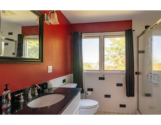 87 Hillview Road Holyoke, MA 01040 - Photo 14 of 26 a bathroom with a granite countertop sink and a mirror