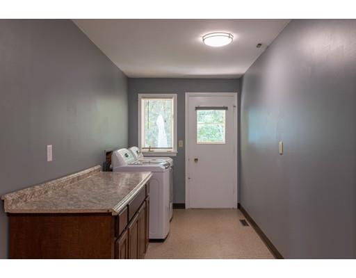 87 Hillview Road Holyoke, MA 01040 - Photo 4 of 26 a kitchen that has a sink and a wooden floor