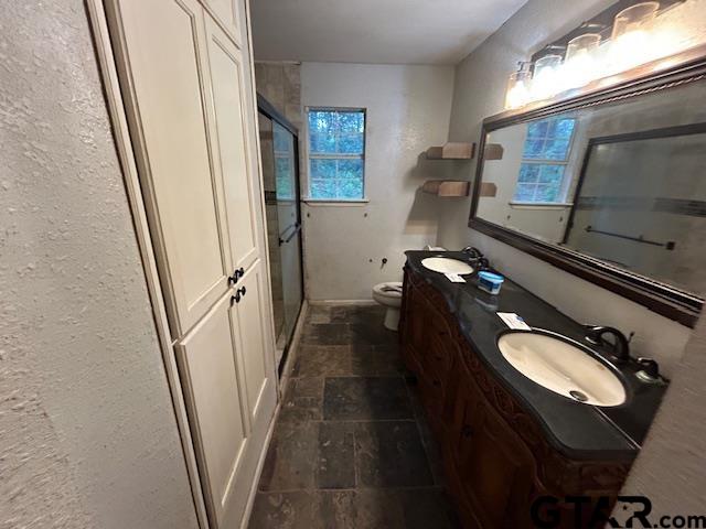 983 Nandena Road Gilmer, TX 75644 - Photo 9 of 9 a bathroom with a sink and mirror