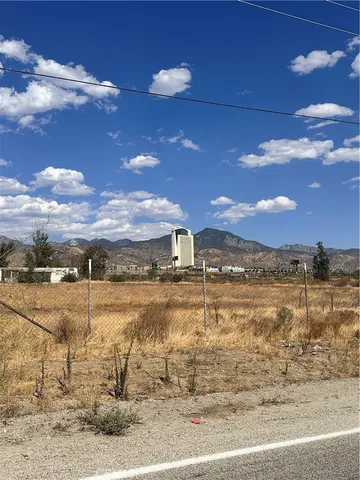 a view of a lake in the sunset
