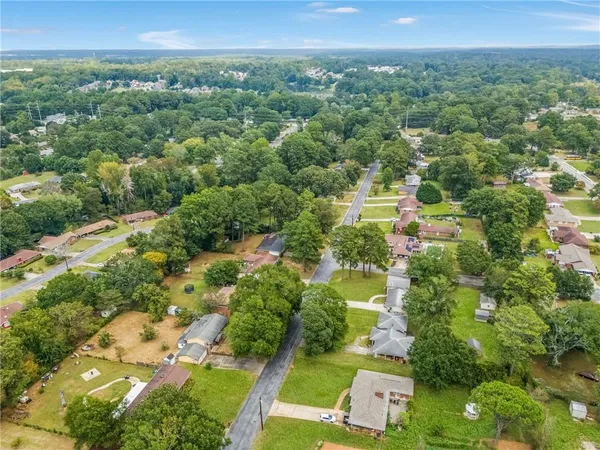 an aerial view of a house with a garden