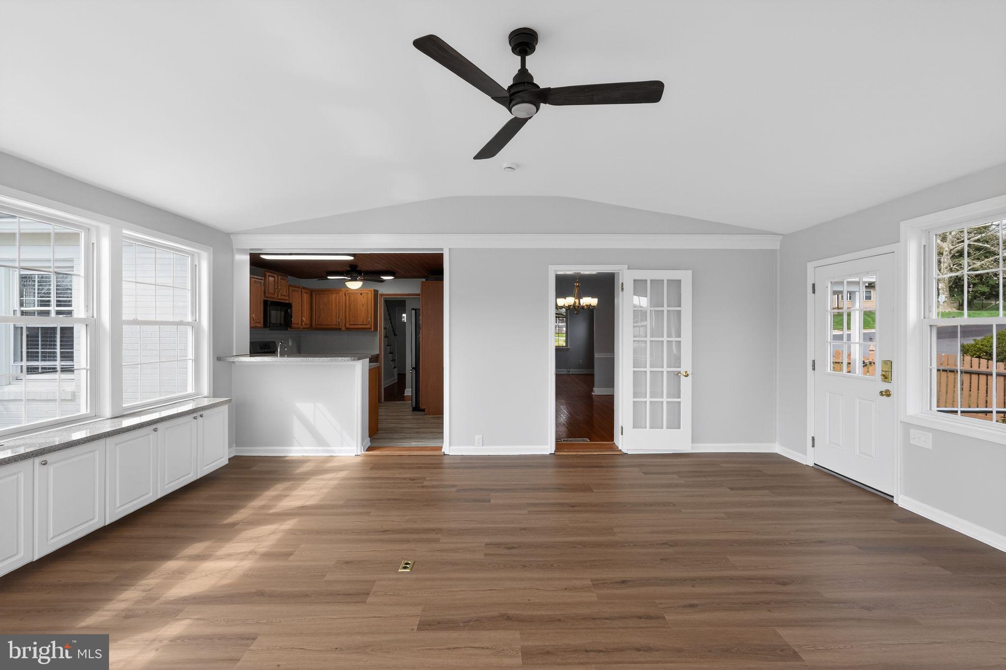 517 Weymouth Road Springfield, PA 19064 - Photo 12 of 31 a view of empty room with wooden floor and window