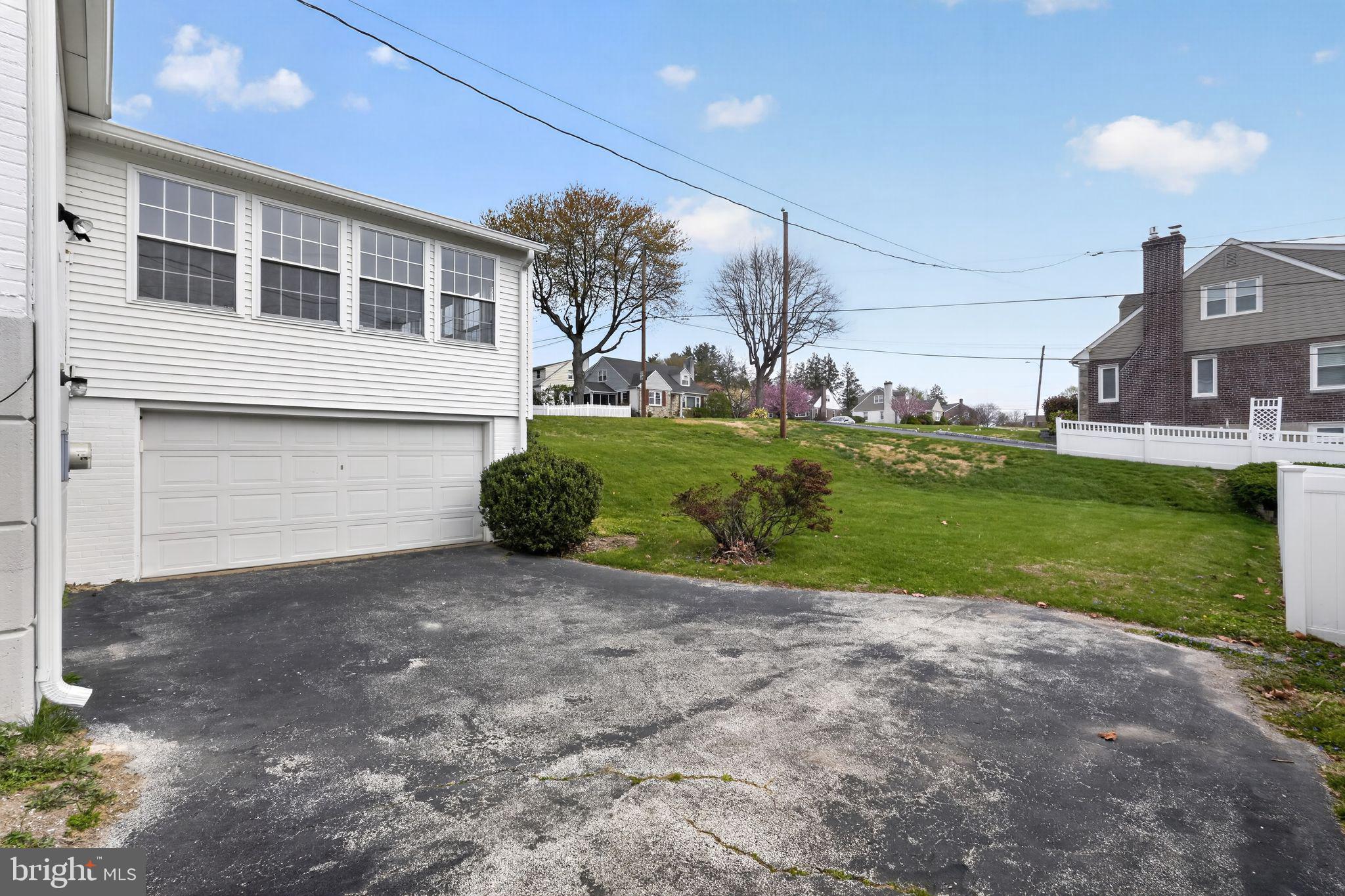 517 Weymouth Road Springfield, PA 19064 - Photo 27 of 31 a view of a house with backyard and garden