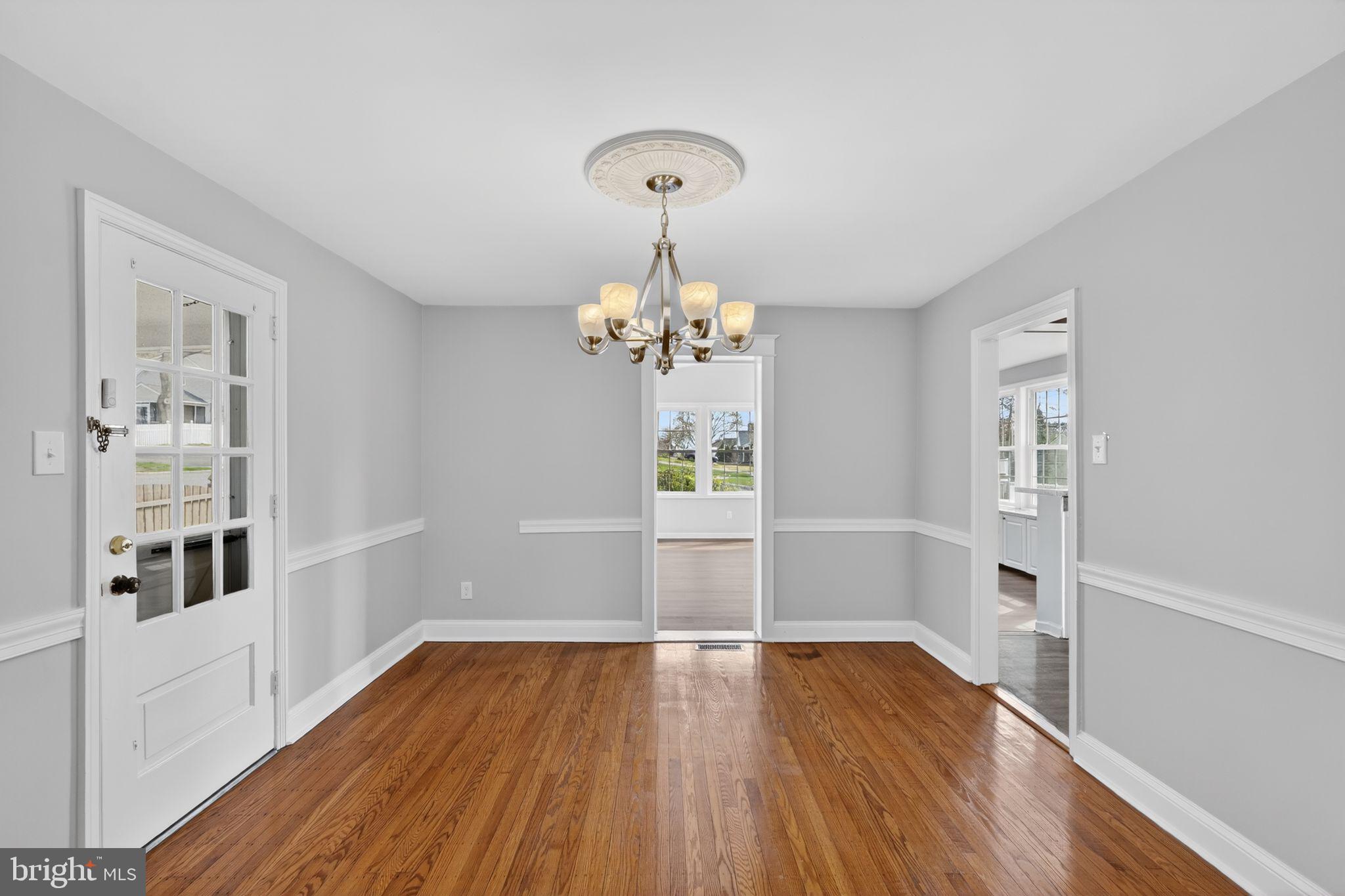 517 Weymouth Road Springfield, PA 19064 - Photo 8 of 31 a view of livingroom with hardwood floor and kitchen