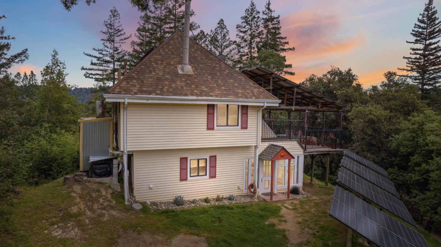 234 Dorrance Road Boulder Creek, CA 95006 - Photo 1 of 45 a backyard of a house with lots of green space