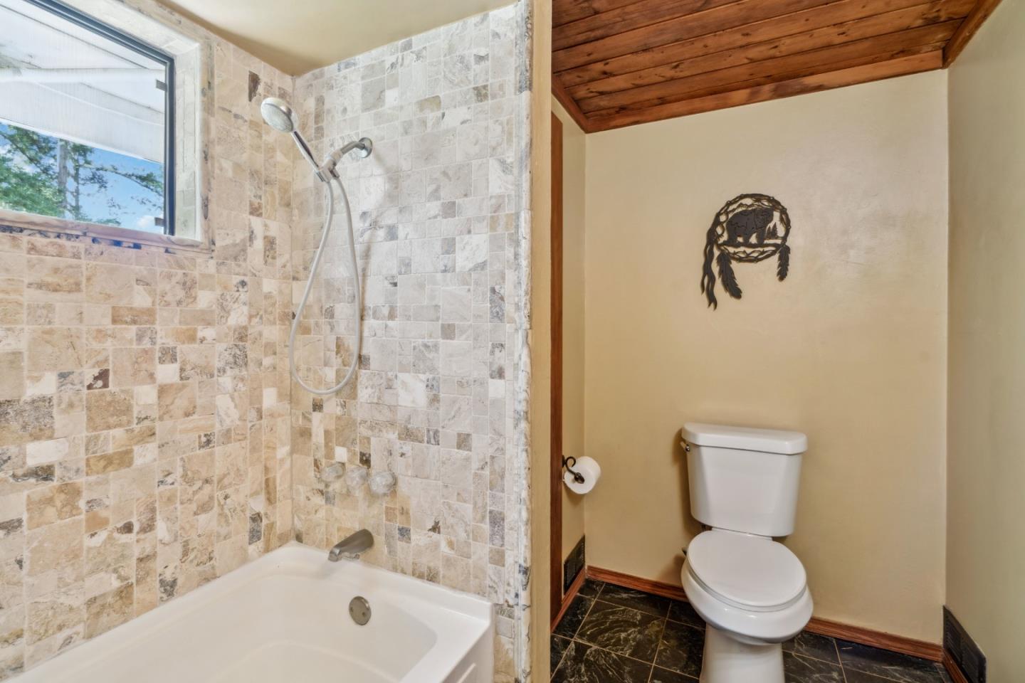234 Dorrance Road Boulder Creek, CA 95006 - Photo 11 of 45 a white toilet sitting next to a bath tub