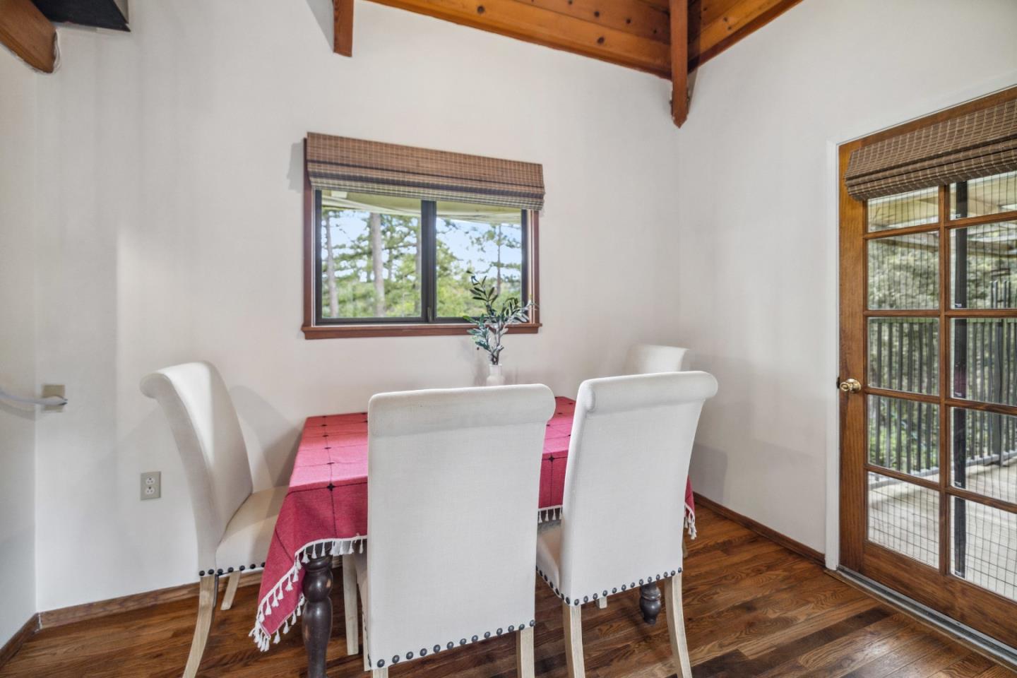 234 Dorrance Road Boulder Creek, CA 95006 - Photo 17 of 45 a view of a dining room with furniture and wooden floor