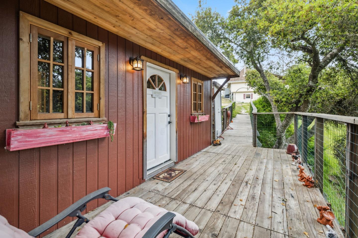 234 Dorrance Road Boulder Creek, CA 95006 - Photo 21 of 45 a view of backyard with cabin and wooden floor