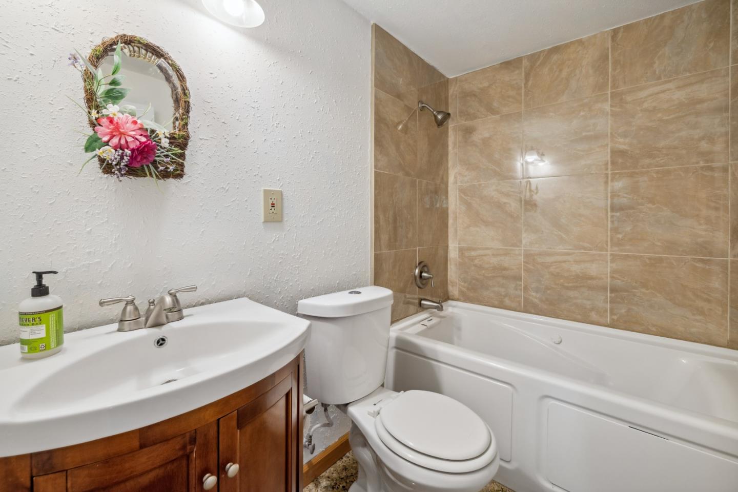 234 Dorrance Road Boulder Creek, CA 95006 - Photo 27 of 45 a bathroom with a sink a toilet and shower