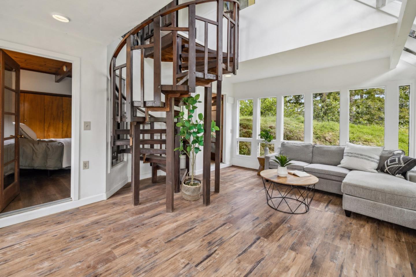234 Dorrance Road Boulder Creek, CA 95006 - Photo 3 of 45 a living room with furniture and a wooden floor