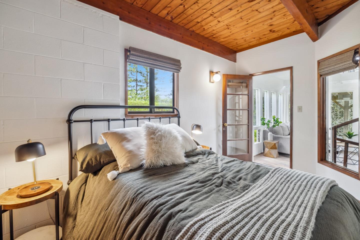 234 Dorrance Road Boulder Creek, CA 95006 - Photo 6 of 45 a bedroom with a bed and window