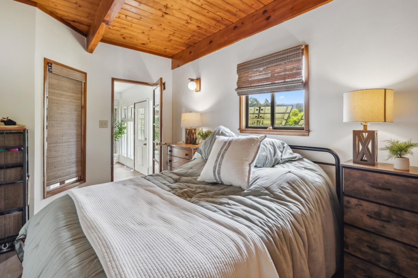 234 Dorrance Road Boulder Creek, CA 95006 - Photo 7 of 45 a bedroom with a large bed and a window