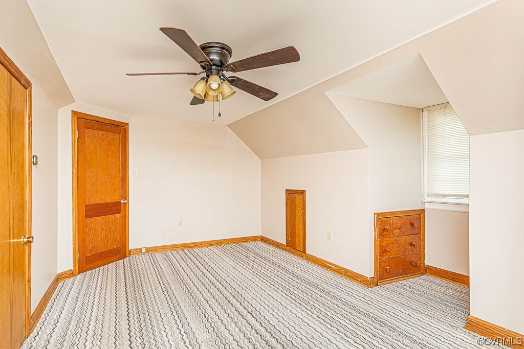7418 Atlee Road Mechanicsville, VA 23111 - Photo 15 of 26 a view of a livingroom with wooden floor and a ceiling fan