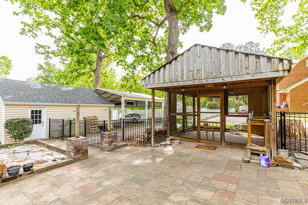 7418 Atlee Road Mechanicsville, VA 23111 - Photo 21 of 26 a backyard of a house with yard and outdoor seating