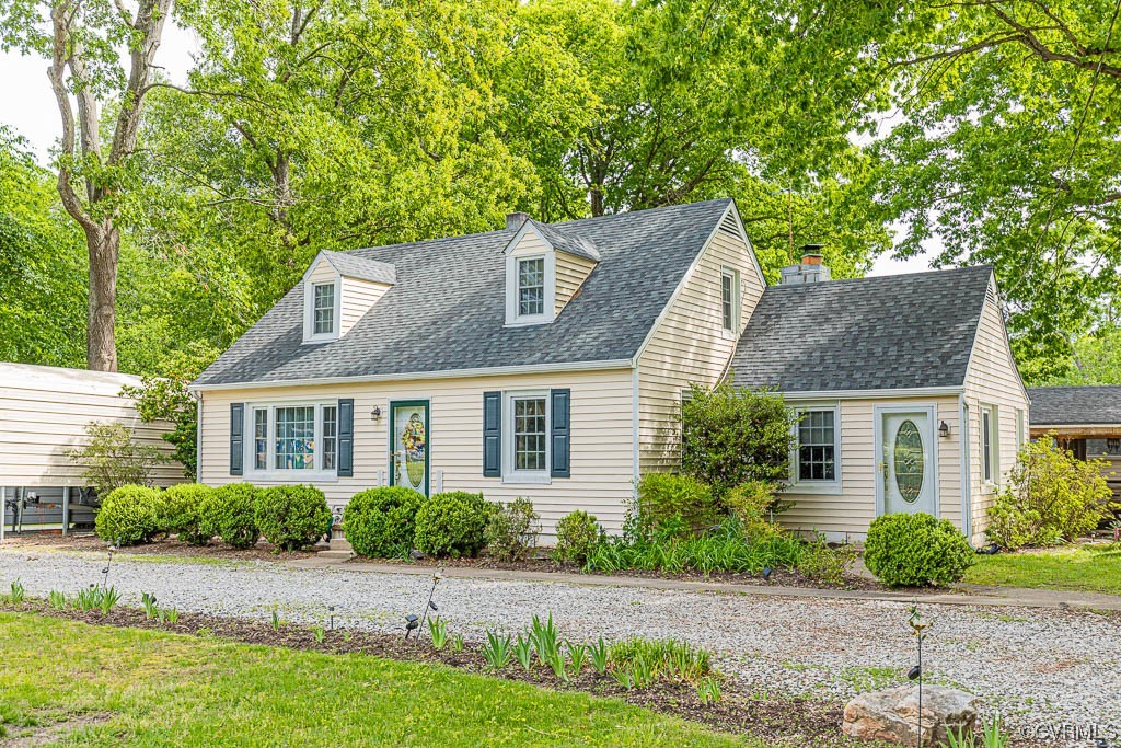 7418 Atlee Road Mechanicsville, VA 23111 - Photo 3 of 26 front view of a house with a yard