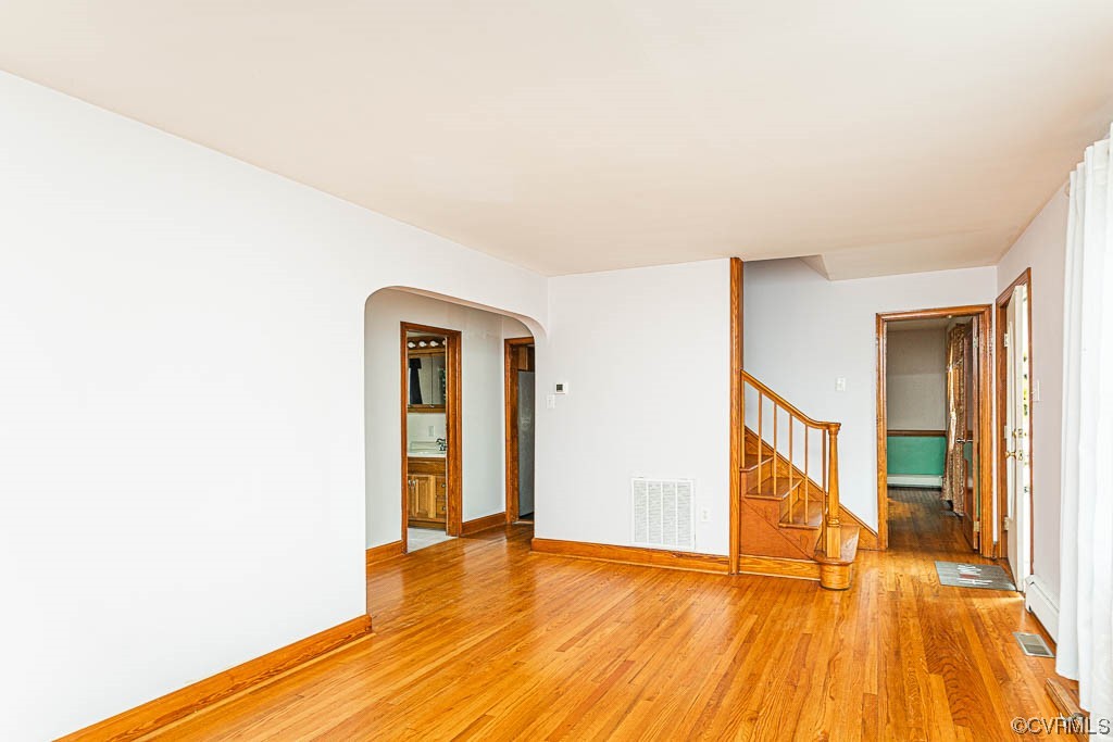7418 Atlee Road Mechanicsville, VA 23111 - Photo 5 of 26 a view of an empty room with wooden floor