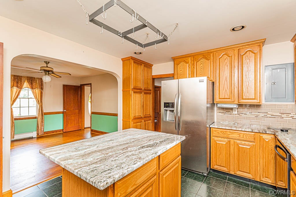 7418 Atlee Road Mechanicsville, VA 23111 - Photo 6 of 26 a kitchen with stainless steel appliances granite countertop a sink refrigerator and cabinets