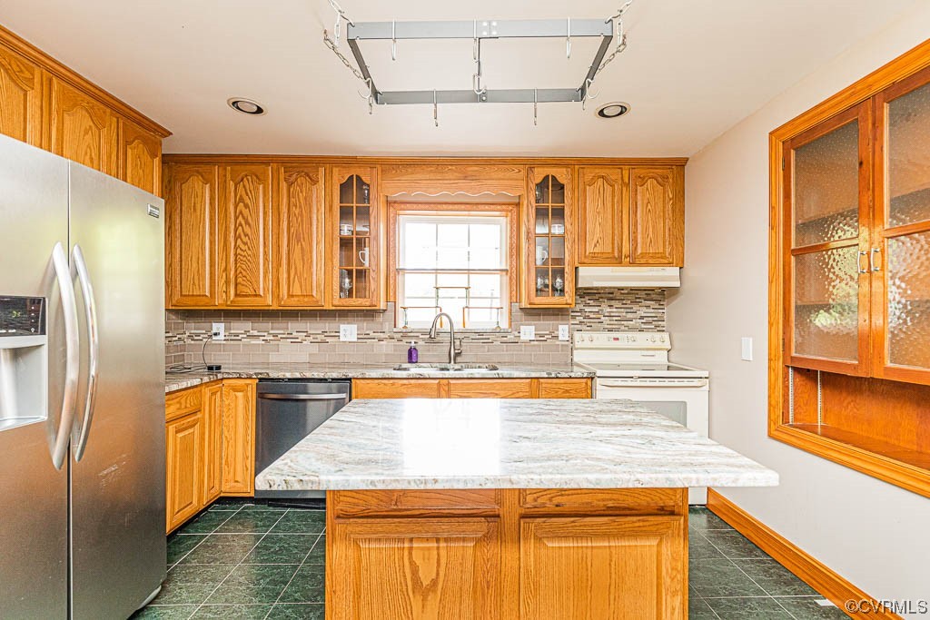 7418 Atlee Road Mechanicsville, VA 23111 - Photo 8 of 26 a kitchen with stainless steel appliances granite countertop a sink stove and refrigerator