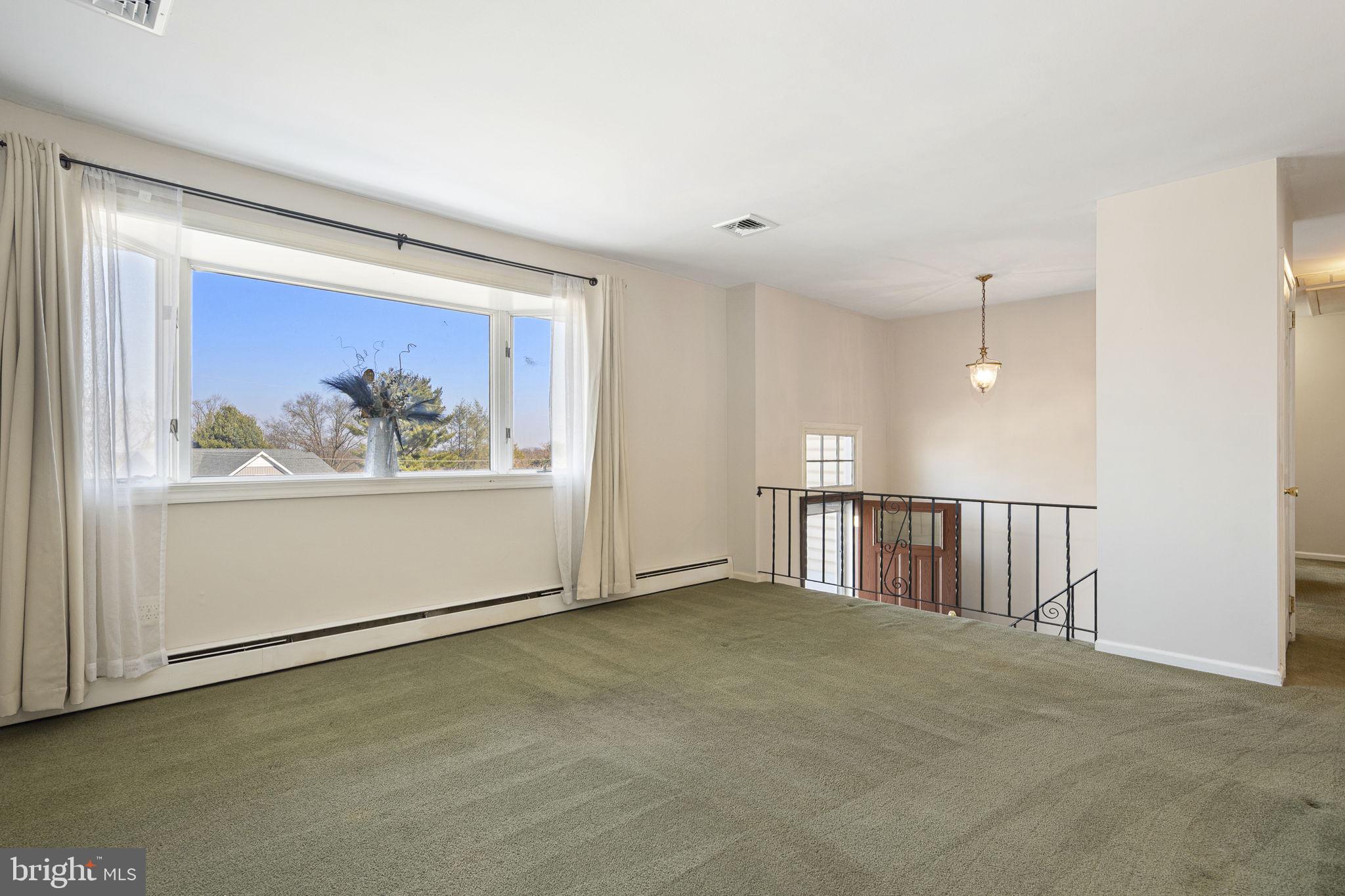 220 Coldstream Road Phoenixville, PA 19460 - Photo 18 of 41 Living room open to foyer area
