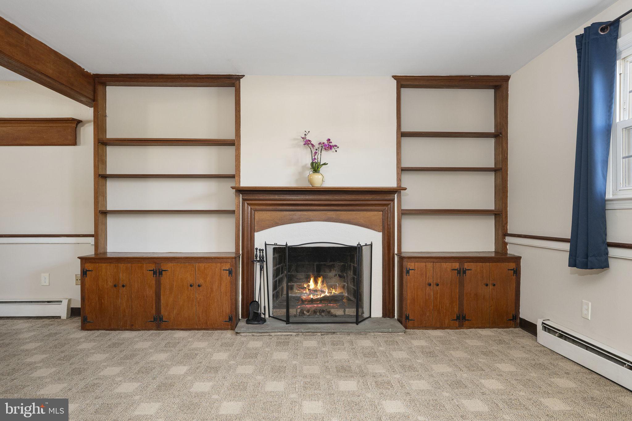 220 Coldstream Road Phoenixville, PA 19460 - Photo 25 of 41 Great Room with custom built in wooden cabinetry
