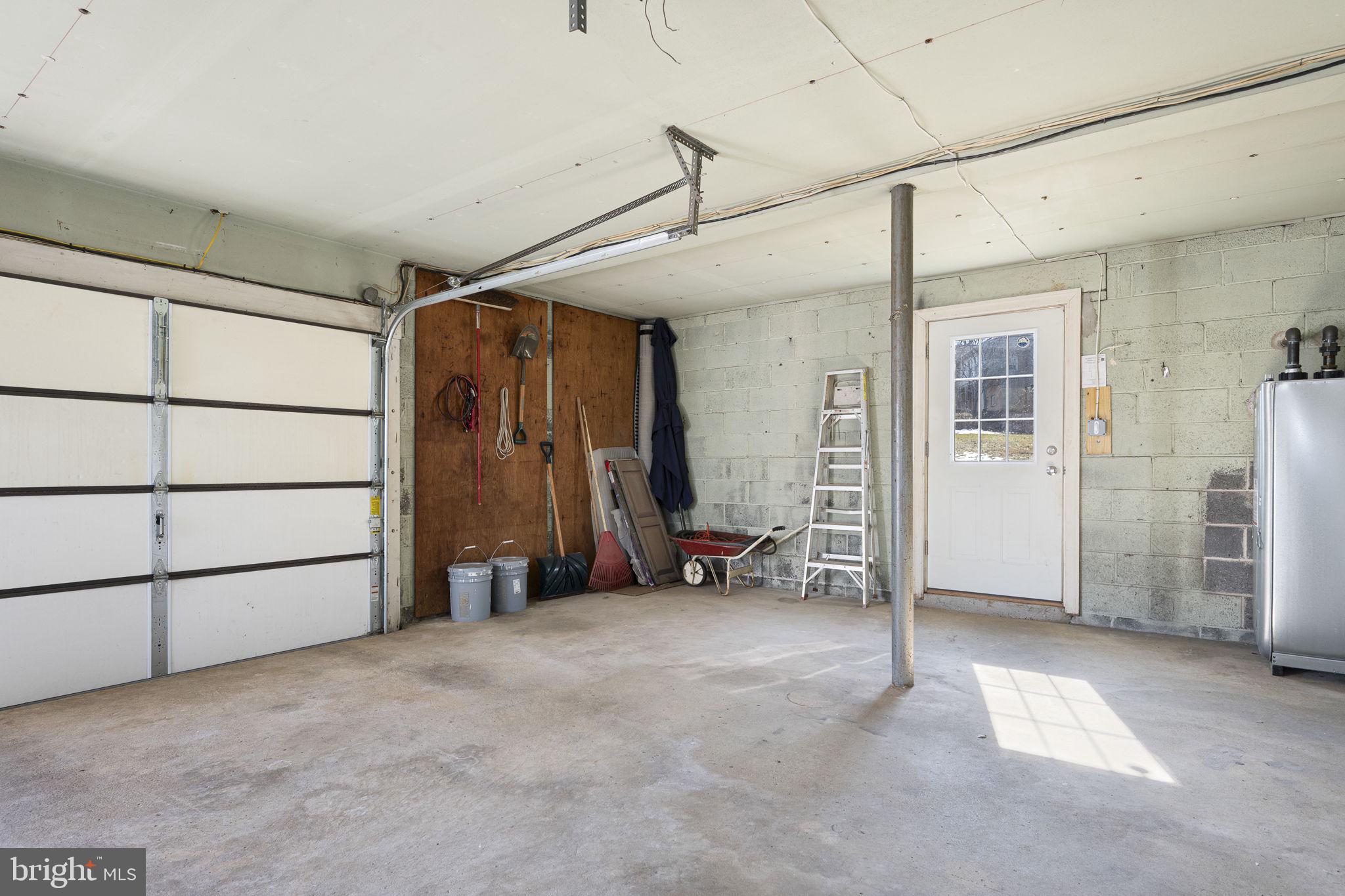 220 Coldstream Road Phoenixville, PA 19460 - Photo 31 of 41 Garage with additional storage on side