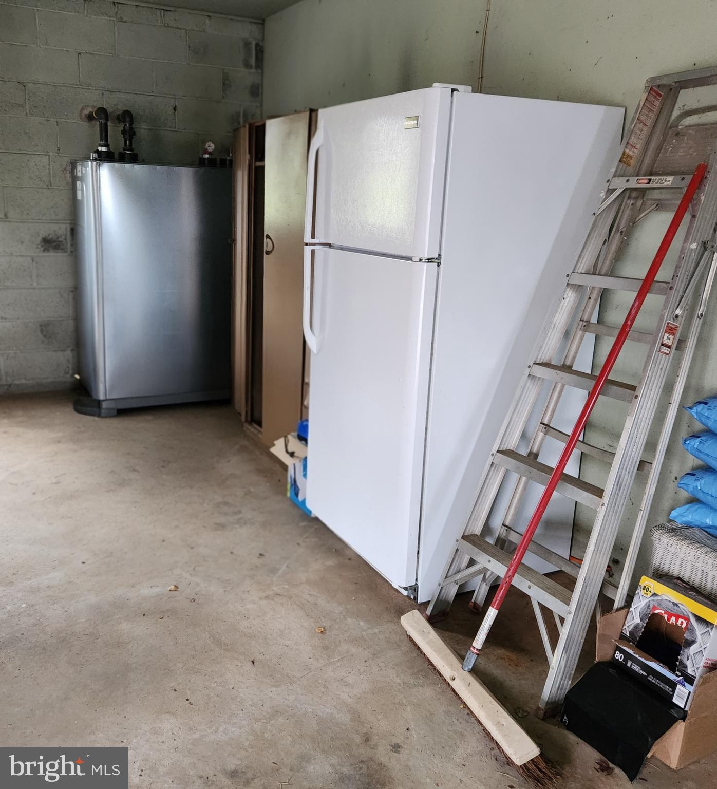 220 Coldstream Road Phoenixville, PA 19460 - Photo 37 of 41 In Garage refigerator/freezer, metal closet...