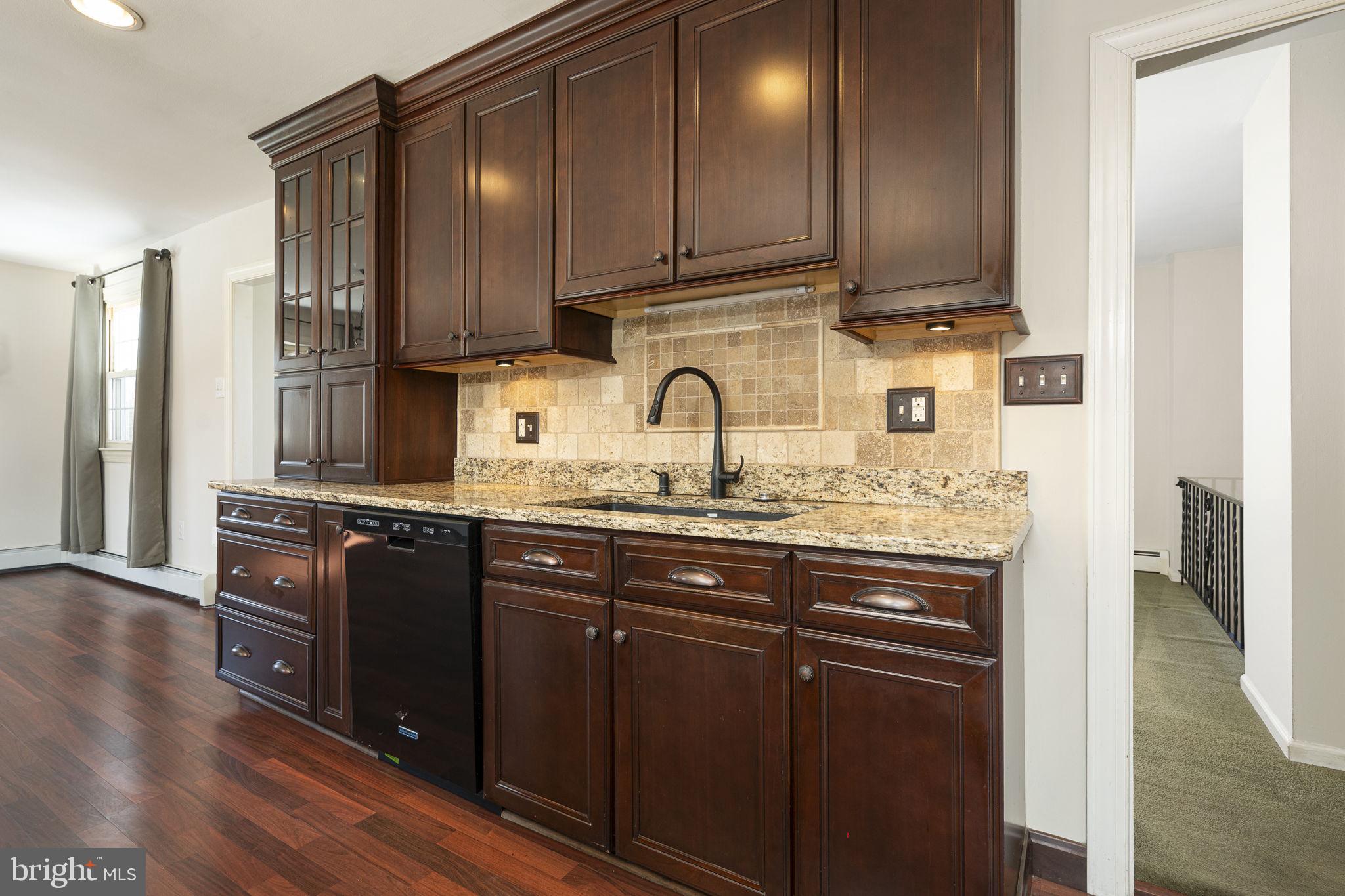 220 Coldstream Road Phoenixville, PA 19460 - Photo 10 of 41 Kitchen with Blanco Sink and bronze hardware